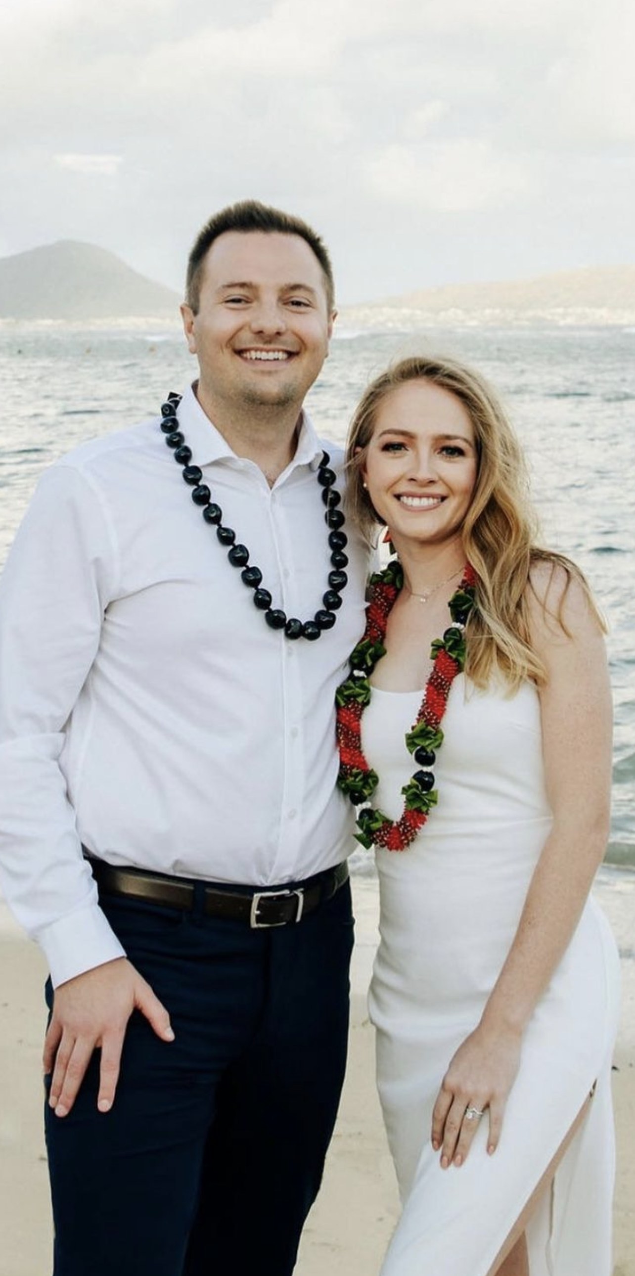 Bride and groom on the beach at their destination wedding