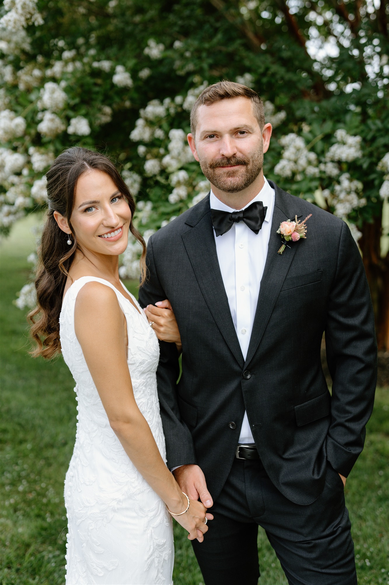 Bride and groom portrait, formal attire, garden backdrop