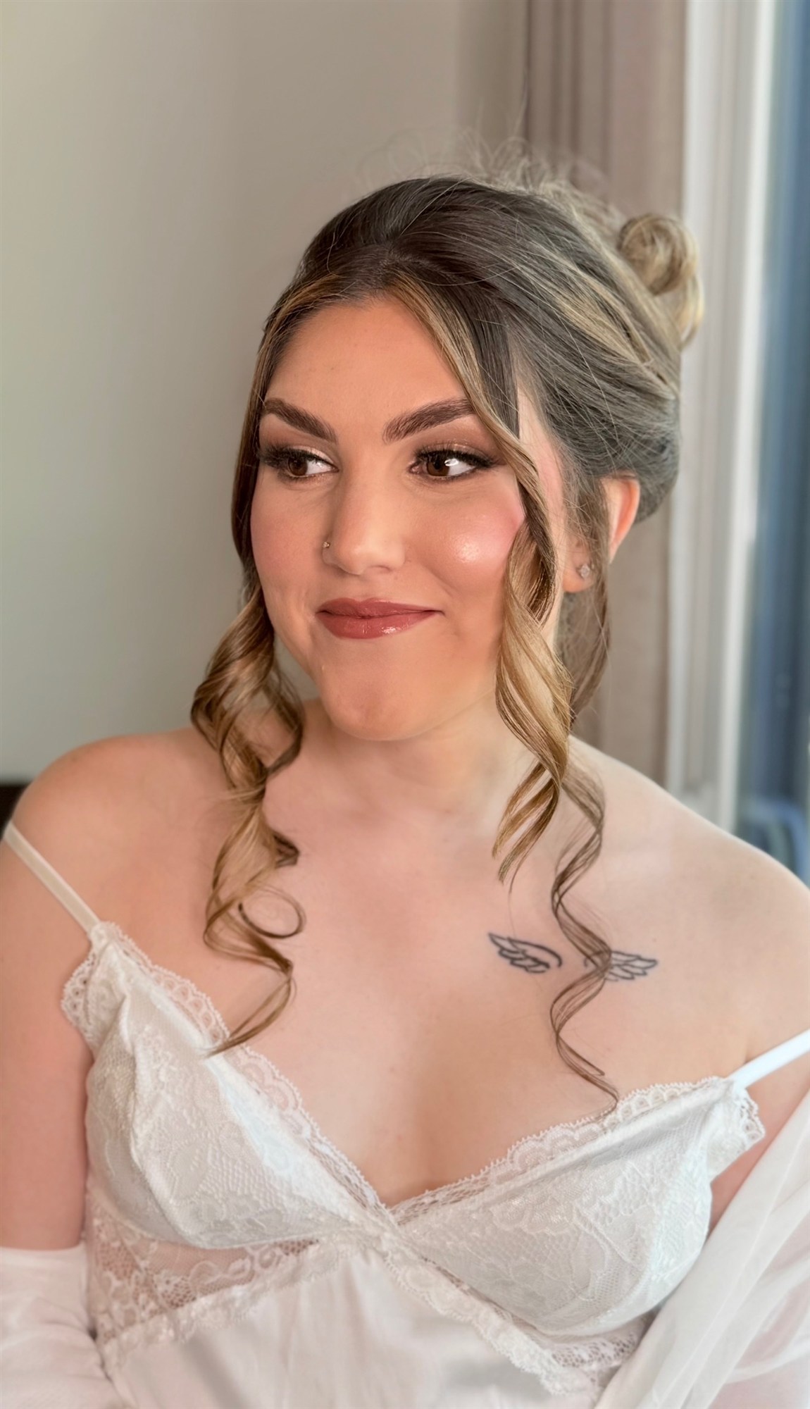 Close-up bridal makeup detail, soft glam with defined eyes