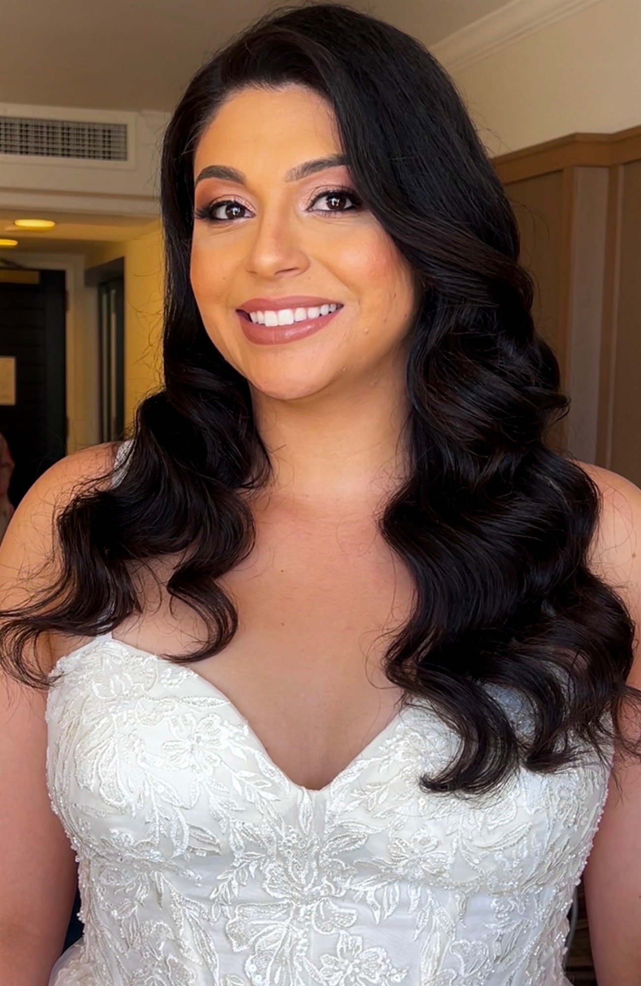 Close-up of finished bridal makeup, natural light portrait